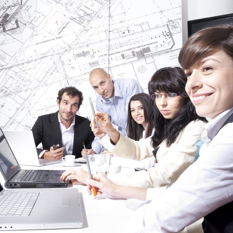 Photo of Employees in Meeting